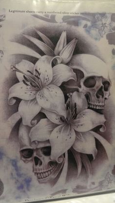 two skulls with flowers on their heads are shown in this tattoo art piece, which depicts the skull and lily bouquets