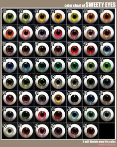 an assortment of different colored eyeballs in various sizes and colors on a black background