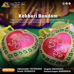 two heart shaped ornaments are sitting next to each other on a green surface with the words, pretty kobari bondam