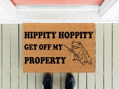 a door mat that says hippity hoppy get off my property