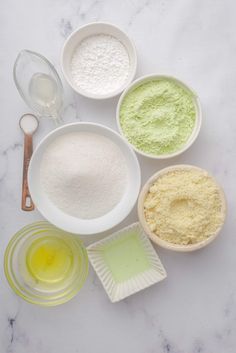 the ingredients to make this cake are laid out in bowls