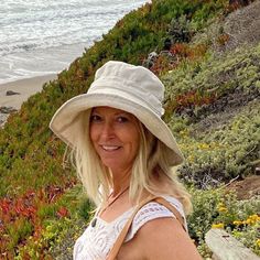 "A handmade sun hat for sunny beach days and summer fun.  This linen sun hat for women has a nice wide brim to protect your whole face and even your neck and chest. A drawstring around the head keeps the hat fitting snug.  Easy to bring along in your bag, folds up easy.   This hat is made from a medium weight homespun linen and cotton blend fabric in a neutral beige color.  Inside liner is white cotton.  I used a stiff interfacing for brim to keep it's shape. Brim measures 4.5\" Crown depth is 3 Travel Bucket Hat With Upf 50+ For Beach Season, Upf 50+ Bucket Hat For Beach Travel, Beachy Sun Hat With Uv Protection, Beige Bucket Hat With Upf 50+ For Travel, Beige Upf 50+ Bucket Hat For Travel, Eco-friendly Fedora Sun Hat For Summer, Eco-friendly Sun Hat With Upf 50+ For Vacation, Eco-friendly Bucket Hat For Spring Vacation, Natural Bucket Hat With Upf 50+ For Warm Weather