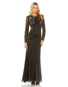 Mac Duggal Sheer hand-embellished overlay; 100% polyester lining Fully lined through body; sheer unlined sleeves High neckline Long sheer sleeves Floral embellishments Sequined fabric throughout Concealed back zipper Approx. 62.5" from top of shoulder to bottom hem Available in Black Gold Style #5956 Black And Gold Gown, Gown Long Sleeve, Sequined Fabric, Boat Neck Long Sleeve, Charmeuse Dress, Formal Wedding Guest Dress, Long Sleeve Evening Gowns, Sleeve Gown, Bride Groom Dress