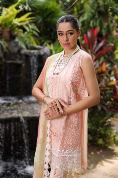 Brand: Saadia AsadProduct: Chikankari D-07BCollection: Noor by Saadia Asad Luxury Chikankari Lawn CollectionFabric: LawnDesign Work: Embroidered PRODUCT DETAILS: Panni & schiffli embroidered lawn front center panel Embroidered inserted panels Panni & schiffli embroidered lawn side panels Dyed lawn back Schiffli embroidered lawn sleeves Printed cambric trouser Digital printed schiffli & sequin embroidered chiffon dupatta Embroidered neckline Panni & sequin embroidered armhole patches Panni & sequin embroidered sleeves border Panni & sequin hem scalloped border DISCLAIMER:* Lining, Laces, and Tassels are not included in unstitched variants.* Embellishment items in stitched outfits are subject to market availability.* Product color may vary due to photographic lighting or your device settings Pakistani Lawn Suits, Scalloped Border, Embroidered Sleeves, Luxury Wear, Pakistani Wedding Dresses, Lawn Suits, Embroidered Neckline, Pakistani Wedding, Fabric Stores Online