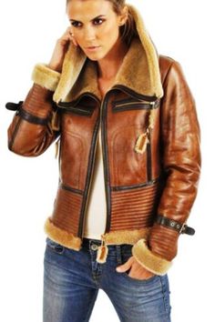 This lovely jacket is genuine 100% full Lambskin Leather, On the Outside of the jacket it is a beautiful leather finish, and on the inside there is a very smooth, supple and warm thick sheepskin (Faux) wool which is 15 mm thick, The jacket has two hand warmer slanted pockets, it also has a straps and buckles on the collar and 1 straps and buckles on the sides which are adjustable, All Seams have been reinforced, The zip is heavy duty.. Tan Brown Colour With Shinny Wax Preium Faux Fur Adjustable waist buckles Soft touch 1" wool throughout Nappa lamb finish Traditional style sheepskin flying jacket Hand cut using tanned skins Two Zipper pockets Authentic and original tanned skins Real leather ages beautifully with time. It takes on the character of the wearer. Natural leather is breathable s Shearling Coat Womens, Aviator Leather Jacket, Aviators Women, Sheepskin Jacket, Aviator Jackets, Fur Coats Women, Shearling Coat, Brown Leather Jacket, Shearling Jacket