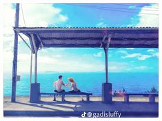 two people sitting on a bench under a canopy next to the ocean and looking at each other