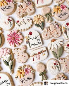 baby in bloom cookies are displayed on a table