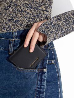 Timeless and practical, this minimalistic black wallet is perfect if you are looking for a no-fuss option. When open, the wallet offers a spacious inner compartment, while its compact design makes it easy to fit into bags of all sizes and back pockets too. Use the zip-around design to keep your belongings safe and secure. Black Daisy, Short Wallet, Black Wallet, Charles Keith, Sand Color, Small Wallet, Compact Design, Card Wallet, Wallets