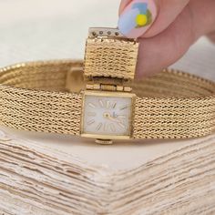 We love a jewel that is both beautiful and functional! We love how this mesh bracelet appears like any other bracelet out there but a quick flip of the lid opens to reveal a slender watch underneath. Chic, elegant, and a perfect addition to any jewelry wardrobe. 14kt yellow gold 6.7” in length, 24.9 pennyweights Diamonds are estimated H/I colors & VS clarities, GIA standards. Please see qualitative report for more information. Engagement Watch, Modern Mens Rings, Art Jewelry Earrings, Fancy Watches, Jewelry Wardrobe, Bespoke Rings, Jewel Necklace, Antique Watches, Mesh Bracelet