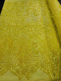 yellow sequins and beads on fabric