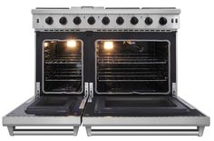 two ovens with lights on each side and one is open to show the inside