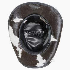 This exquisite Pinto leather cowboy hat offers the perfect combination of western and urban style. Its classic western outback brim, hair on calf mid crown, and brown three-braided band with a brown leather tab make for a sophisticated and timeless design. Whether you're looking to complete a cosmopolitan look or embrace your inner cowboy, this classic piece will always be en vogue. Featuring a super comfortable removable sweatband liner that attaches securely with velcro tabs sewn-in to the hat Western Leather Fedora For Kentucky Derby, Leather Fedora Hats For Rodeo, Leather Brimmed Fedora For Rodeo, Western Leather Fedora With Flat Brim, Western Style Leather Fedora With Flat Brim, Leather Fedora For Rodeo With Short Brim, Fitted Leather Fedora Hat, Fitted Brown Leather Fedora, Wide Brim Leather Fedora For Western-themed Events