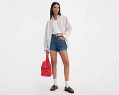 A vintage-inspired flattering fit featuring the higher-than-high rise that made the '80s the fashion decade we can’t stop talking about. With an updated design and sustainably produced denim, think of these '80s Mom Shorts as your parent’s shorts, but better. A vintage, 80s-inspired fit Featuring a 10 3/4-inch high rise With an A-line leg opening for a leg-lengthening effect We made this garment with post-industrial recycled cotton fiber Engineered to keep you cool and wick away moisture Retro Straight Leg Jean Shorts For Spring, Chic Levi's Summer Jeans, Trendy Everyday Levi's Bottoms, Chic Summer Levi's Jeans, Casual Mom Fit Jeans For Summer, Levi's Relaxed Fit Casual Jean Shorts, Levi's Casual Relaxed Fit Jean Shorts, Trendy Levi's Straight Leg Jean Shorts, Retro High Rise Jean Shorts With Relaxed Fit