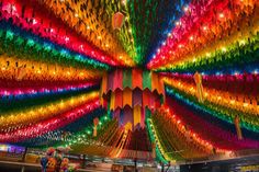 the ceiling is decorated with multicolored lights