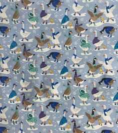 a blue background with birds and snowflakes on it's sides, all in different colors