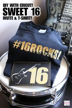 a t - shirt with the number sixteen printed on it sits in front of a guitar