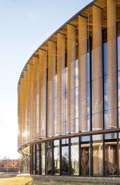 a large building with many windows on the side