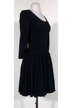 Comfy knit dress in a flared silhouette. Dress this up with a pair of pumps and a statement necklace. This LBD will become a closet staple! Size P 72% viscose, 28% poleyster Slips on Rounded neckline Long sleeve Ribbed skirt Above knee Bust 28" Waist 24" Shoulder to hem 33.5" Chic A-line Ribbed Midi Dress, Chic A-line Ribbed Dress, Chic Ribbed A-line Dress, Stretch Ribbed A-line Dress, Elegant Ribbed Mini Dress, Formal Stretch Ribbed Dresses, Elegant Ribbed Evening Dress, Evening Stretch A-line Midi Dress, Silhouette Dress