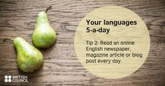 two pears sitting next to each other on top of a wooden table with the words your languages 5 - a - day