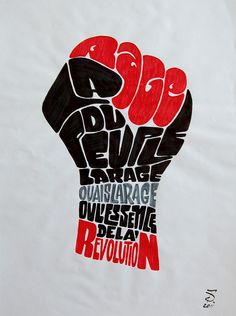 a drawing of a fist with the words revolution written in different languages and colors on it