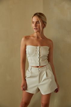 cream vegan faux leather strapless tube top with buttons - bustier stitched top - faux leather bustier top Leather Bustier Top, Faux Leather Shorts, Hey Babe, American Threads, Leather Bustier, Strapless Bustier, Strapless Neckline, Corsets And Bustiers, Going Out Tops