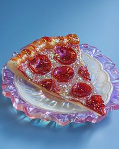 a slice of pizza on a glass plate with glitter toppings and heart shaped slices