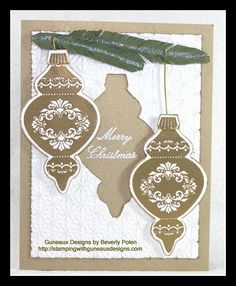 a card with two ornaments hanging from it