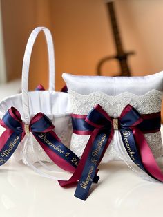 two wedding garters with ribbons tied around them