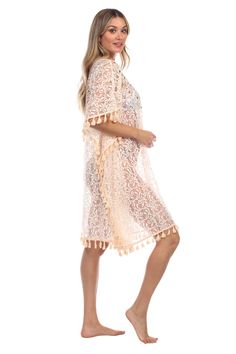 Lace Crochet Kaftan Cover Up Wholesale by La Moda. This cover up is made of lace, crochet trim and v-neck is the perfect accessory to highlight life's most precious moments. Holidays are made for relaxing by the pool, lounging with friends at the beach, or adventures that take you somewhere you'll never forget Crochet Lace Cover-up For Beach Season, Beige V-neck Crochet Beach Dress, Crochet Lace Cover-up For Vacation, Spring Beachwear Crochet Lace Top, Spring Lace Crochet Top For Beachwear, Bohemian Crochet Lace For Spring, Spring Bohemian Crochet Lace, Bohemian Summer Lace With Lace Patchwork, Bohemian Lace With Lace Patchwork For Summer