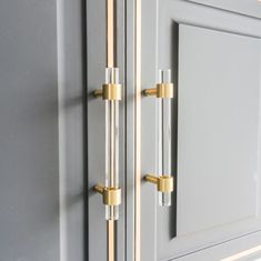 a close up of a door with two handles on the front and back of it