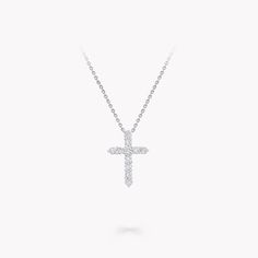 A precious interpretation of a classic motif, our small cross pendant in white gold is available in a variety of different carat weights, seen here with 0.10 carat diamonds. Deftly suspended from a white gold chain, each diamond is embraced by a minimal metal setting, optimising their brilliance and presence. The Classic Graff collection celebrates the purity and fire of the finest Graff diamonds showcased in truly timeless jewels and eternally elegant silhouettes. A precious interpretation of a Graff Jewelry, Luxury Diamond Jewelry, Graff Diamonds, Diamond Drop Pendant, Round Diamond Pendant, Pear Shaped Diamond Ring, Rare Diamond, Necklaces Diamond, Round Diamond Earrings