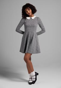 In a stylish black and off-white plaid, this 60’s-inspired fit-and-flare dress from our ModCloth namesake label is so much fun to style ! Made from a drapey woven fabric, this long sleeve dress boasts a contrasting white collar and cuffs with scalloped detailing, delicate shirring at the shoulders, a fitted bodice and an ample, knee-length flare skirt with handy side pockets. Full of charm with a bit of an edge, this playful A-line dress is sure to become a favorite in your vintage-inspired coll 1960 Fashion, Statement Outfit, Valentines Day Dresses, Practice Outfits, Plaid Outfits, New Years Eve Dresses, Pretty Blouses, Retro Clothing, Body Con Skirt