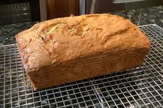 a loaf of bread sitting on top of a cooling rack