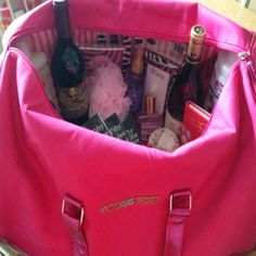 a pink bag filled with lots of bottles