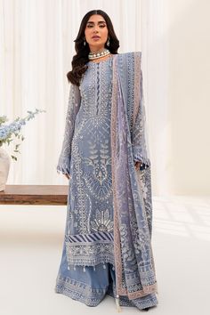 Pakistani Kameez Sharara Heavily Embroidered Grey Wedding Dress is an elegant attire that will give you a trendy as well as classy look on the big day. Hand-worked details of embroidery and embellishments make this Lehenga Dress an epitome of beauty. Embroidered Kameez : The Wedding Dress Kameez Sharara is a traditional choice to wear on the big day. This classy masterpiece has an embroidered neckline, sleeves, and borders. Lavish designs and fine details of hand-crafted ornaments make this Paki Pakistani Kameez, Silk Sharara, Lehenga Dress, Grey Wedding Dress, Desi Dress, Desi Outfits, Desi Wedding Dresses, Luxury Pret, Pakistani Style