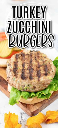 turkey zucchini burgers with lettuce and tomato slices on the side