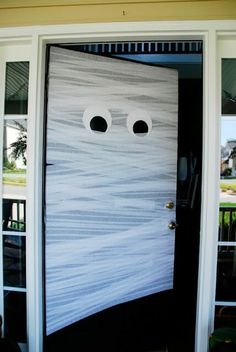 a door decorated to look like a ghost