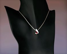 "Mozambique Garnet Necklace - Argentium Silver - 3440 - Argentium Chain Included. A contemporary, yet timeless design by award winning designer, David Worcester. ( IMPORTANT - PLEASE READ 1. AND 2 BELOW ) 1.) Included in the price is an Argentium silver chain appropriate for the pendant chosen. You can choose from 16\", 18\" or 20\" length at checkout. 2.) PLEASE LOOK AT THE MEASUREMENTS CAREFULLY. Some photos have been enlarged to show detail, while others have been minimized to fit the frame. Modern Sterling Silver Heart Pendant Necklace, Modern Heart Pendant Necklace For Gift, Modern Heart Pendant Necklace Gift, Red Pendant Necklace With Polished Finish, Modern Silver Birthstone Necklaces, Red Polished Pendant Necklaces, Modern Silver Birthstone Necklace, Minimalist Necklace With Tension Setting For Gift, Modern Teardrop Pendant Necklaces For Gifts