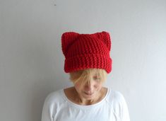 This knit cat ear hat is perfect for cat lovers, both teens and adults,men and women. This kitty cat hat is so comfortable and fun to wear! I made this cat hat with hight quality acrylic wool mix yarn. This knit hat best fits most. I can easily customize it to fit your sizes as well:) Hand wash in warm water and lay flat to dry. My other hats and beanies http://www.etsy.com/shop/bysweetmom?section_id=10599517 If you have any questions about the item just feel free to contact me anytime :) 100% H Cute Red Winter Hat, Casual Knitted Cat Ears Hats, Casual Crochet Cat Ears Hat For Winter, Winter Casual Crochet Hat With Cat Ears, Casual Crochet Hat With Cat Ears For Winter, Casual Cat Design Beanie Hat, Casual Beanie With Cat Design, Casual Knitted Beanie With Cat Ears, Casual Beanie Hat With Cat Design