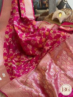 Indulge in luxury with our Banarasi Handloom Katan Silk Saree in stunning rani pink. This exquisite saree is made from the finest quality of silk, certified by Silk Mark for its authenticity and elegance. Elevate your style with this exclusive piece, perfect for any special occasion. Banarasi Handloom Katan Silk Saree - Silk mark certified - rani pink Saree comes with a blouse piece. Fall and pico done. Fully stitched blouse shown in pictures is optional and can be purchased seperately from our blouses and croptops section. For saree video please connect with us on whatsapp @469-937-0606 Ready to be shipped in USA from San Diego, California. All pictures are original pictures. Colors may slightly vary due to pic resolution. Luxury Pink Katan Silk Blouse Piece, Rani Pink Saree, Rani Pink, Katan Silk Saree, Saree Silk, Katan Silk, Pink Saree, Blouse Piece, Silk Saree