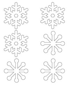 four snowflakes that have been cut out to look like they are from different angles