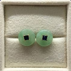 18K Gold Blue Sapphire Jadeite Ear Studs A classic pair of blue sapphire ear studs with jadeite ear jackets. These tiny square blue sapphires are set on four-prong ear posts, paired with 18K gold silicone ear backs. The jadeite ear jackets are natural type A icy light green jadeite donuts. The donut jadeites are translucent with good texture and fair clarity. One of the donuts has natural stone unevenness, as shown in the photo. There are no stone lines. A pair of vermeil gold threaders is included, allowing you to wear the donut jadeites as threaders or ear studs. Thus, the earrings offer three different ways of wearing - blue sapphire ear studs, blue sapphire with jadeite ear studs or jadeite threaders for one price. Photographs with black and white backgrounds were taken indoors, while Classic Jade Jewelry For May Birthstone, Elegant Round Jade Gemstones, Fine Jewelry Round Clip-on Earrings, Fine Jewelry Clip-on Round Earrings, Formal Round Jade Jewelry, Classic Round Jade Jewelry, Formal Jade Gemstone Jewelry, Fine Jade Jewelry For Formal Occasions, Classic Jade Jewelry With Matching Earrings