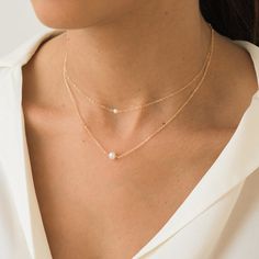 Chic Everyday Pearl Necklace, Pearl Layered Necklace With Pearl Charm For Gifts, Pearl Charm Layered Necklace Gift, Gift Pearl Charm Layered Necklace, Delicate Pearl Chain Necklace For Formal Occasions, Elegant Silver Layered Necklace For Gift, Feminine Formal Necklaces With Pearl Chain, Feminine Formal Necklace With Pearl Chain, Elegant Pearl White Necklace For Gift