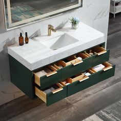 a bathroom vanity with two sinks and drawers