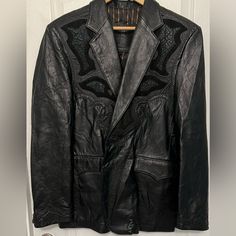 Cuadra Jacket. Made In Mexico With The Certificate Of Authenticity Attached With Tags. It Is Lamb Material (Borrego) Black Fitted Western Outerwear, Fitted Black Western Outerwear, Black Western Leather Jacket, Black Western Leather Jacket For Winter, Western Style Black Leather Jacket For Winter, Fitted Black Western Leather Jacket, Luxury Black Long Sleeve Sport Coat, Certificate Of Authenticity, Mens Jackets