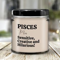 a glass jar that says pisces me, creative and hilarrous on it