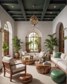 a living room filled with lots of furniture and potted plants on top of tables