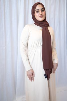 The Basic Long Sleeve Maxi Dress - Vanilla Creme is the perfect garment to transition from day to night. Crafted from a soft, lightweight fabric, it is comfortable and breathable. The long, flowy sleeves add style to the look and the creme color is versatile and suitable for any occasion. An essential for every hijabi's wardrobe. These maxi dresses slip on with ease and provide full coverage. A subtle waistband gives it that A-line shape for a beautiful flow that flatters most body types. All si Long Flowy Sleeves, Creme Color, Flowy Sleeves, Basic Long Sleeve, Sleeve Maxi Dress, Long Sleeve Maxi, Modest Outfits, Long Sleeve Maxi Dress, Fitted Dress