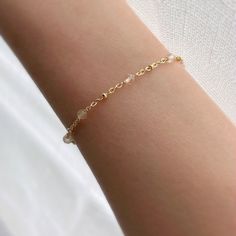 * DETAILS* This dainty bracelet is a perfect gift to the one you love or to yourself. A nice every day bracelet. - Citrine Faceted Beads 3mm - 24K Gold Filled Chain - 14K GOLD FILLED Wire - 14k Gold Filled Spring Ring Clasp - 14k Gold Filled Link Rings ✨ All components are 14k Gold Filled. 👉🏻For more birthstone bracelets, see https://www.etsy.com/shop/JinnysJewelryBySeJin You may also like 🌟Sapphire Bracelet. https://www.etsy.com/JinnysJewelryBySeJin/listing/871033001/sapphire-14k-gold-filled Carved Stone Jewelry, Stackable Necklaces, Carnelian Bracelet, Wedding Bridesmaid Jewelry, Emerald Bracelet, Birthday Gift For Women, Rock Jewelry, Birthstone Bracelet, Bridal Earrings Pearl