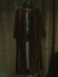 Very thick velvet opera coat. Lined. Perfect condition. Bought in Vienna, great for keeping warm with elegance Long Velvet Coat For Fall, Formal Fitted Long Sleeve Cape, Long Sleeve Velvet Outerwear For Costume, Long Sleeve Velvet Costume Outerwear, Winter Formal Fitted Cape, Formal Fitted Winter Cape, Elegant Long Sleeve Outerwear For Costume Party, Elegant Formal Robe For Fall, Vintage Velvet Winter Outerwear